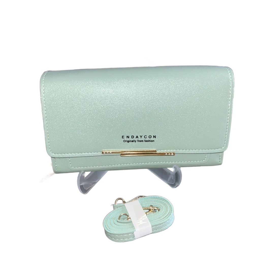 Mint Green Crossbody w/ adjustable strap. PU/Faux Leather New in package